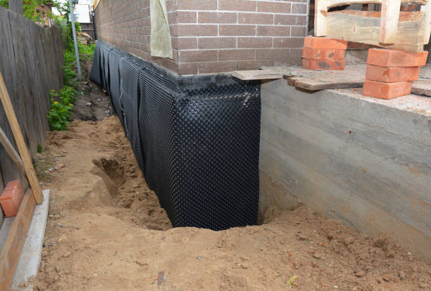 Happy homeowners after waterproofing job in Glenwood